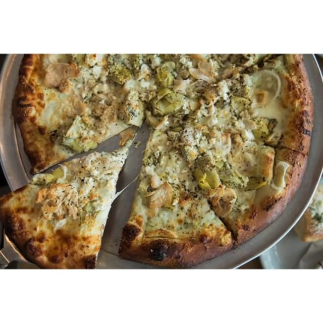 Our Famous Chicken & Artichoke Pizza & 1/2 & 1/2 Pizza.
