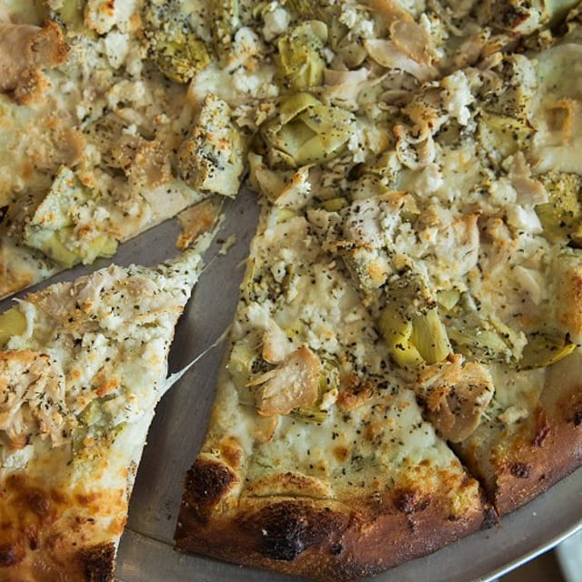 Our Famous Chicken & Artichoke Pizza.