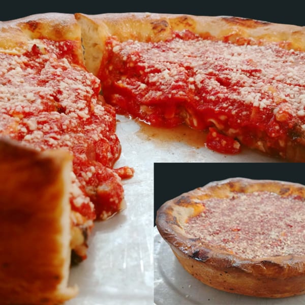 Deep dish pizza with a thick crust, rich red sauce, and a generous sprinkle of parmesan cheese.